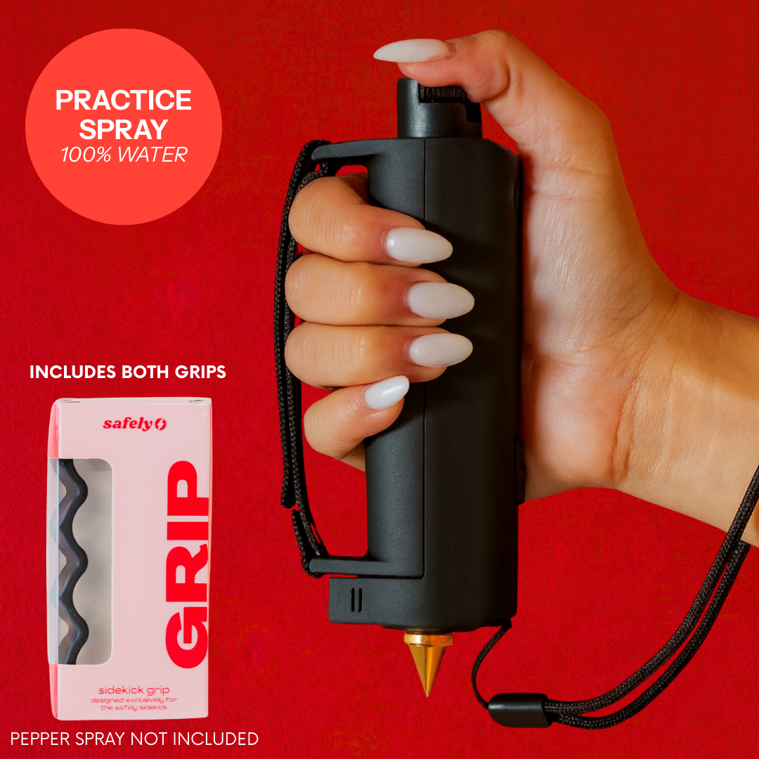Black Safely Sidekick with both grips and practice spray