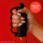 Black Safely Sidekick with knux grip and practice spray