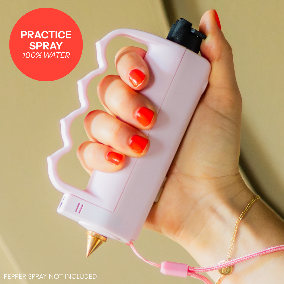 Pink Safely Sidekick with knux grip and practice spray