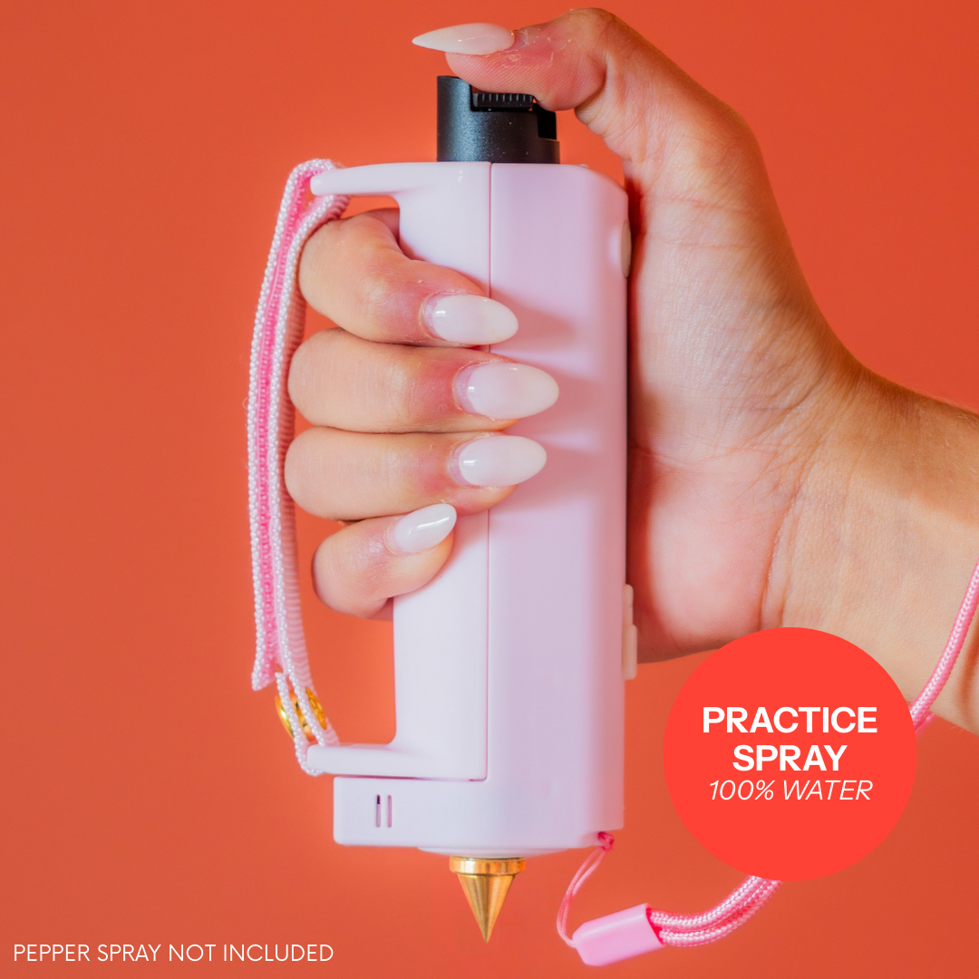 Pink Safely Sidekick with strap grip and practice spray